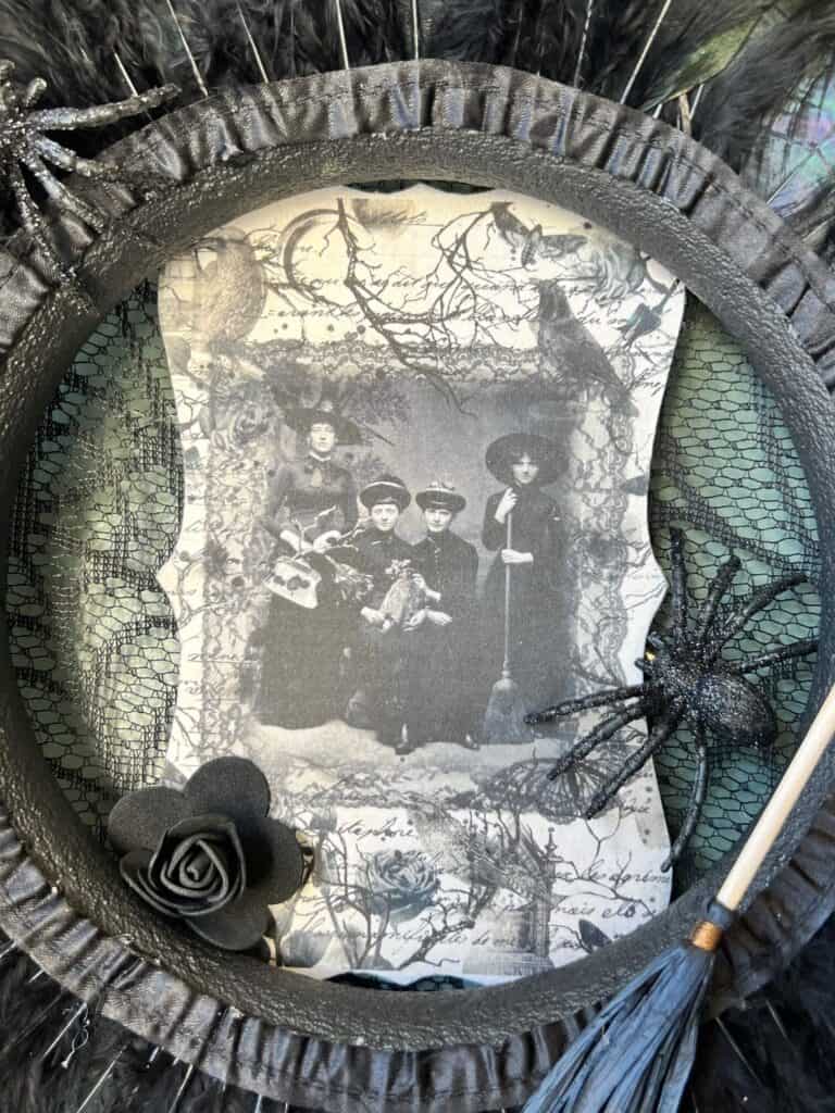 Close up of the real vintage witches rice paper sign that is in the middle ofthe wreath.