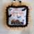 Dollar Tree Halloween Pot Holder with a Ghost, bats, and an old truck that says "Happy Haunting with orange tulle trim around the edge and a black and white buffalo check wood bead hanger, DIY doorknob hanger.