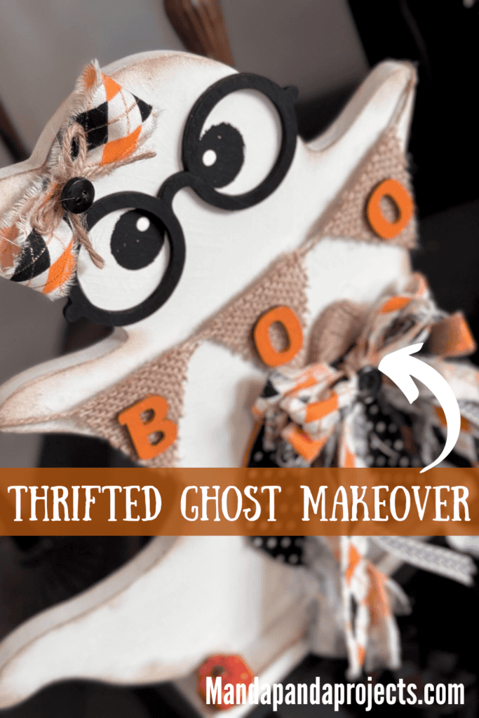 Cute thrifted wood standing ghost makeover with a black and white polka dot pumpkin, a burlap banner that says "BOO", black eyeglasses, and an orange and black fabric bow.