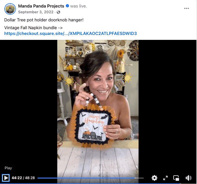 Amanda holding the completed project on a Facebook live thumbnail.