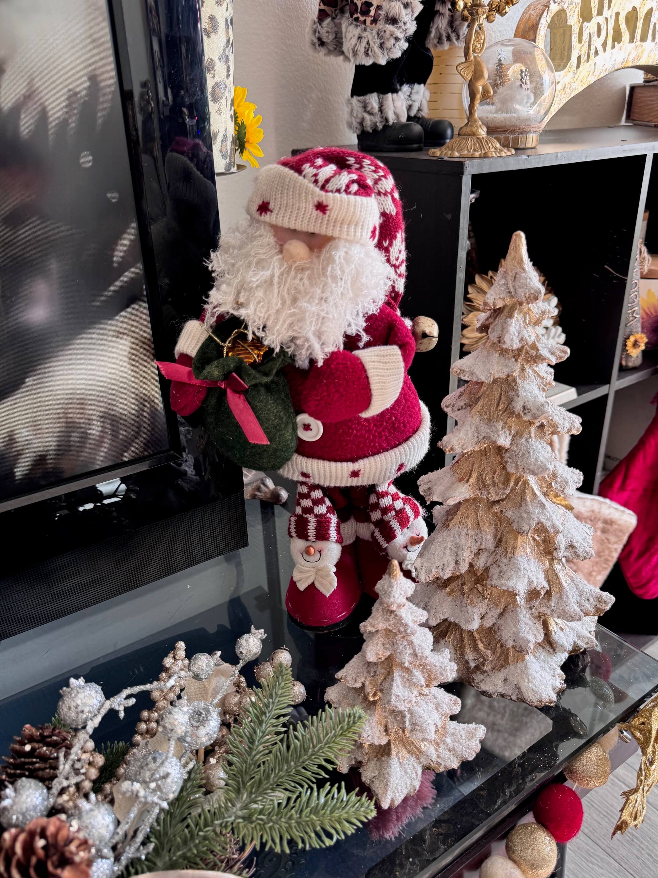 Gold resin Christmas tree set and a thrifted Santa with snowmen boots.