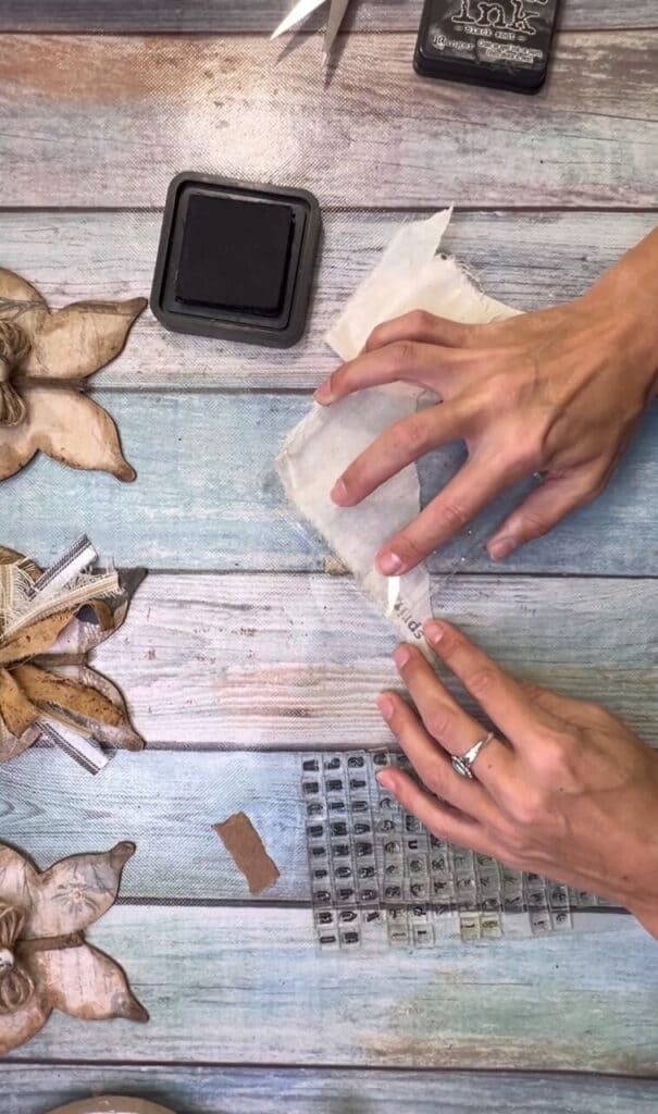Stamp the word "spring" onto muslin.