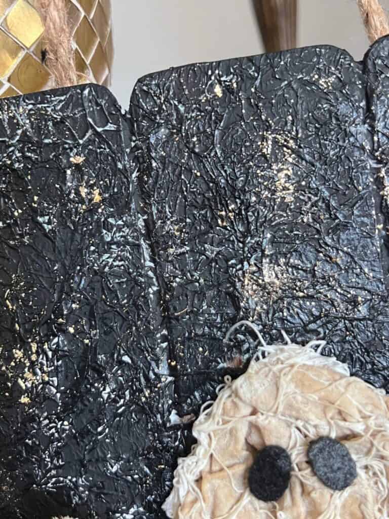 The background of the craft with black and gold starry night look.