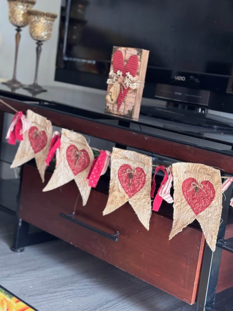 Primitive Style Valentines Day Heart Garland or banner with coffee stained muslin, deep red hearts, skeleton key embellishments and red homespun fabric DIY Decor.