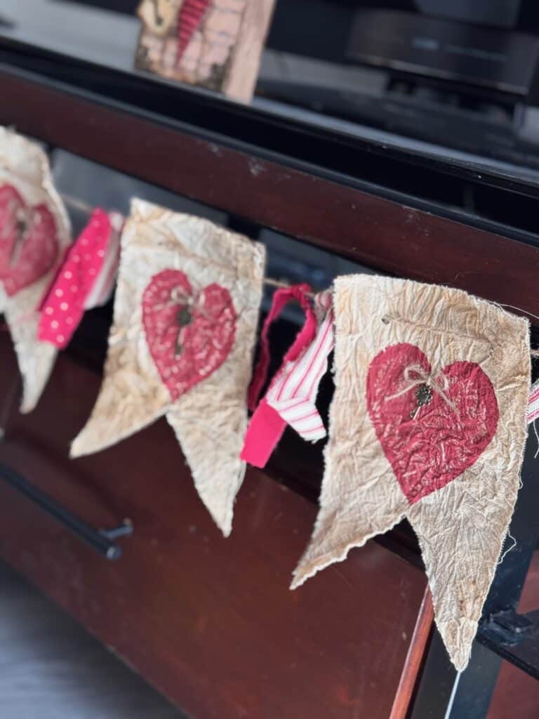 Primitive Style Valentines Day Heart Garland or banner with coffee stained muslin, deep red hearts, skeleton key embellishments and red homespun fabric DIY Decor