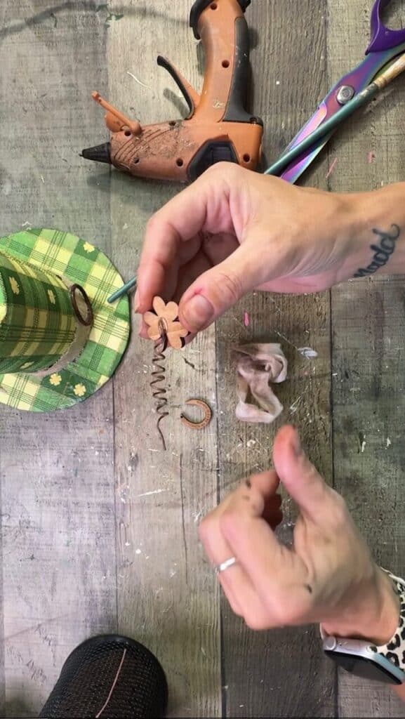 Using rustic wire to make a spring.