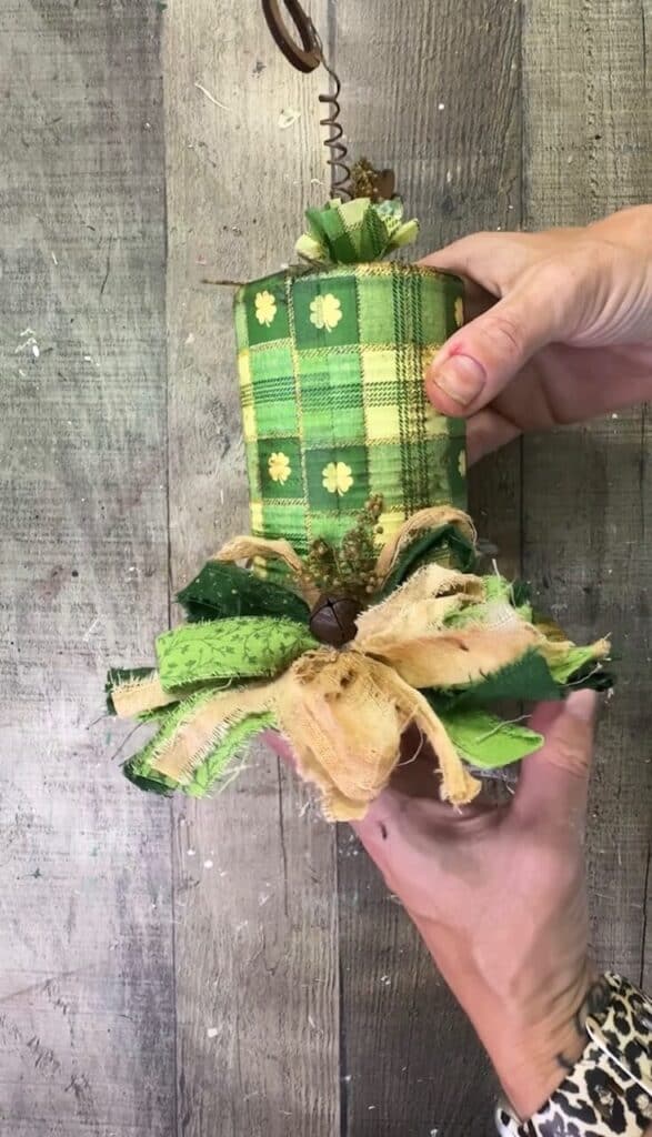 Adding a rusty bell and Sweet Annie to the bow.